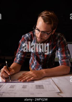 Man, architecture and drawing of blueprint idea, working and planning for construction. Architect, building and engineering for infrastructure, design Stock Photo