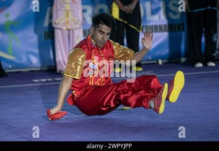 Greece, Greece. 9th Mar, 2024. An athlete performs during the opening ceremony of the Acropolis-Forbidden City International Wushu Tournament in Athens, Greece, on March 9, 2024. Credit: Panagiotis Moschandreou/Xinhua/Alamy Live News Stock Photo