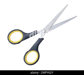 Top view of a pair of small multipurpose scissors with black handle is isolated on white background with clipping path. Stock Photo