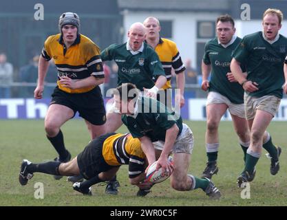 HAWICK V CURRIE, BT CELLNET CUP SEMI FINAL, 30/3/02. Hawick's John Houston looks for support as he is brought down. Stock Photo