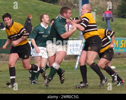 HAWICK V CURRIE, BT CELLNET CUP SEMI FINAL, 30/3/02. Hawick's Craig Dunlea takes on Currie fullback Mike Duncan. Stock Photo