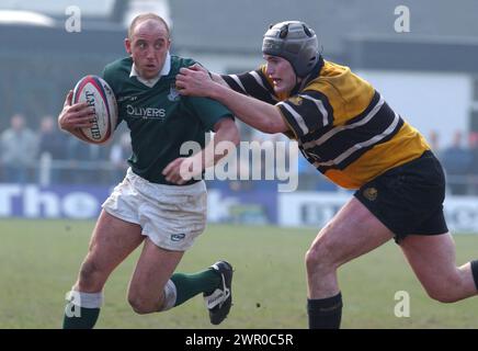 HAWICK V CURRIE, BT CELLNET CUP SEMI FINAL, 30/3/02. Hawicks scrum half Kevin Reid takes on the Currie defence. Stock Photo