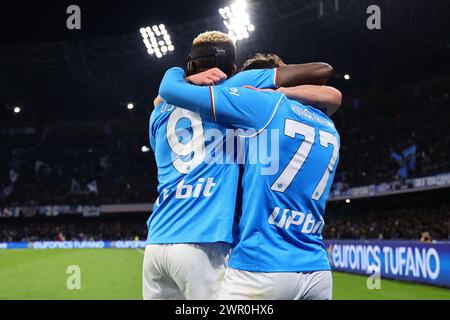 Khvicha Kvaratskhelia of SSC Napoli celebrates with team mate Victor Osimhen,  after scoring the goal of 1-0  during the Serie A football match between SSC Napoli and Torino FC at Diego Armando Maradona stadium in Naples (Italy), March 8th, 2024. Stock Photo