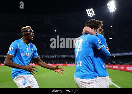 Khvicha Kvaratskhelia of SSC Napoli celebrates with team mates Victor Osimhen (1l) and Mario Rui (1r) after scoring the goal of 1-0  during the Serie A football match between SSC Napoli and Torino FC at Diego Armando Maradona stadium in Naples (Italy), March 8th, 2024. Stock Photo