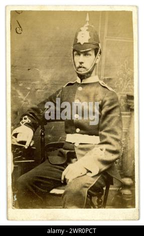 Original Victorian Carte de Visite (visiting card or CDV) studio portrait of Victorian military man wearing a British Army Home service helmet. Unknown British Regiment U.K., Circa 1870's. Stock Photo