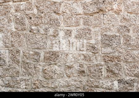 Stone wall background. Closeup front view of Light gray wall texture Stock Photo