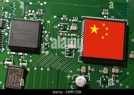 Flag of the Republic of China on microchip of a printed electronic circuit board. Concept for supremacy in global microchip and semiconductor manufact Stock Photo