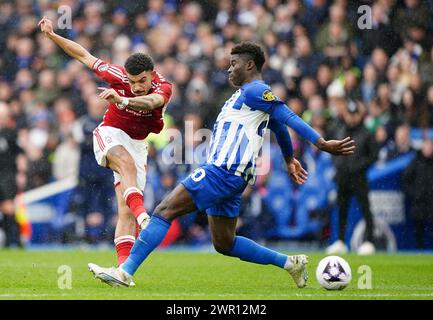 Nottingham Forest's Morgan Gibbs-White attempts a shot on goal during the Premier League match at the American Express Stadium, Brighton. Picture date: Sunday March 10, 2024. Stock Photo