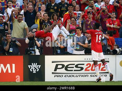 JULY 30 2011: Nani (17) of Manchester United in midair after scoring the first goal during a World Football Challenge match against FC Barcelona at Fedex Field, in Landover, Maryland.Manchester United won 2-1. Stock Photo