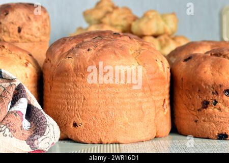 Without sugar fudge or decorations, Easter cakes stand in a group on the table. Stock Photo