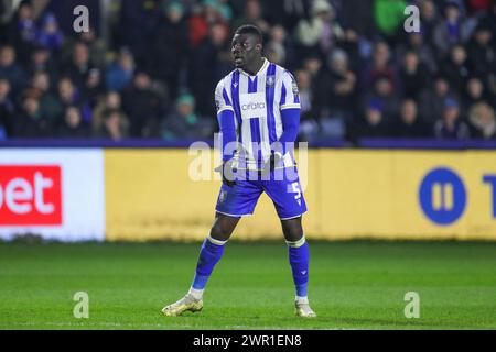 Sheffield Wednesday defender Bambo Diaby  (5) gestures during the Sheffield Wednesday FC v Leeds United FC sky bet EFL Championship match at Hillsborough Stadium, Sheffield, United Kingdom on 8 March 2024 Stock Photo