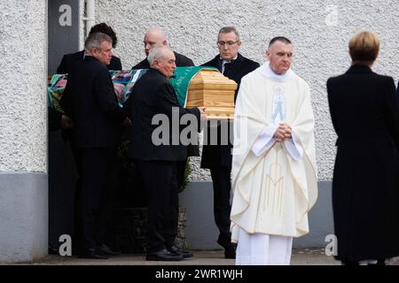 The coffin of 12-year-old Saoirse Ruane is carried into Saints Peter ...