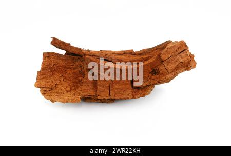 Decorative part of red wood isolated over white background. Cracked dry red wood as a decorative design element. Stock Photo