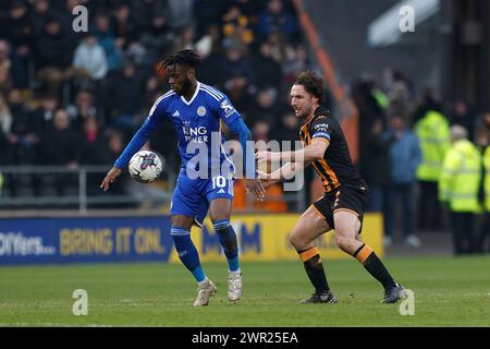 Stephy Mavididi of Leicester City in action with Hull City's Lewis Coyle during the Sky Bet Championship match between Hull City and Leicester City at the MKM Stadium, Kingston upon Hull on Saturday 9th March 2024. (Photo: Mark Fletcher | MI News) Credit: MI News & Sport /Alamy Live News Stock Photo