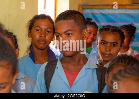 Miandrivazo, Madagascar 20 october 2023. Happy Malagasy school children in classroom. schoolchildren smile and look at teacher. There are many childre Stock Photo