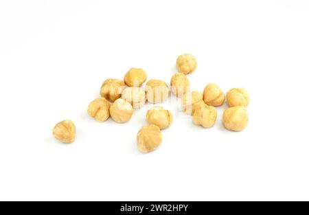 Pile of roasted nuts isolated on white background. Shelled kernels. Package design element with clipping path Stock Photo