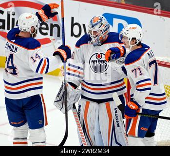 Pittsburgh, United States. 10th Mar, 2024. Edmonton Oilers center Ryan McLeod (71) joins Edmonton Oilers goaltender Calvin Pickard (30) and Edmonton Oilers defenseman Mattias Ekholm (14) to celebrate the 4-0 win against the Pittsburgh Penguins at PPG Paints Arena in Pittsburgh on Sunday, March 10, 2024. Photo by Archie Carpenter/UPI. Credit: UPI/Alamy Live News Stock Photo