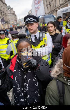 The police watch over protestors in Farragut Square as they get ready ...