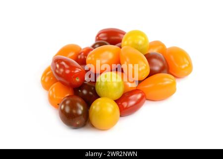 Different sorts of tomatoes isolated on white background. Stock Photo