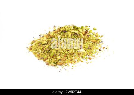 Ground, milled, crushed or granulated pistachio pile isolated on white background Stock Photo