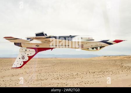 The United States Air Force Air Demonstration Team “Thunderbirds” perform a photo chase mission over Navy Air Facility El Centro, Calif Stock Photo