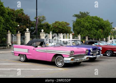 HAVANA, CUBA - AUGUST 27, 2023: Heavily modified pink Chevrolet Impala Convertible 1958 in streets of Havana, Cuba Stock Photo