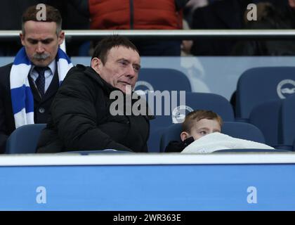 Brighton and Hove, UK. 10th Mar, 2024. Snooker player Jimmy White watches from the stands during the Premier League match at the AMEX Stadium, Brighton and Hove. Picture credit should read: Paul Terry/Sportimage Credit: Sportimage Ltd/Alamy Live News Stock Photo