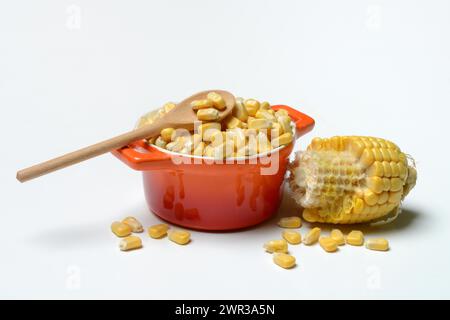 Fresh maize kernels in pots and cobs, corn (Zea mays) Stock Photo