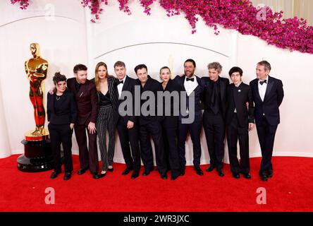 Hollywood, United States. 10th Mar, 2024. (L-R) Marie-Ange Luciani, guest, Justine Triet, David Thion, Arthur Harari, Jehnny Beth, Laurent Sénéchal, Swann Arlaud, Milo Machado-Graner and guest arrive on the red carpet at the 96th annual Academy Awards in Los Angeles, California on Sunday, March 10, 2024. Since 1929, the Oscars have recognized excellence in cinematic achievements. Photo by John Angelillo/UPI Credit: UPI/Alamy Live News Stock Photo