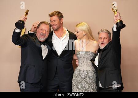 Hollywood, United States. 10th Mar, 2024. Dave Mullins and Brad Booker, the filmmakers behind the Best Animated Short film, 'The War is Over! Inspired by the Music of John and Yoko,' appear backstage with their Oscars and presenters Anya Taylor-Joy and Chis Hemsworth at the 96th annual Academy Awards in Los Angeles, California, on Sunday, March 10, 2024. Since 1929, the Oscars have recognized excellence in cinematic achievements. Photo by Pat Benic/UPI Credit: UPI/Alamy Live News Stock Photo