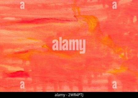 red and orange painted watercolor background on papwe texture Stock Photo