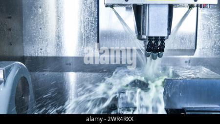 Metalworking CNC milling machine. Cutting metal modern processing Hi-technology machining concept. Stock Photo