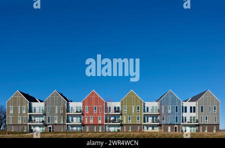 Condominiums and apartments in a new housing development with new roads and schools. Stock Photo