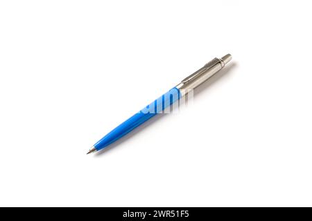 Blue plastic and metal ballpoint pen on white isolated background Stock Photo