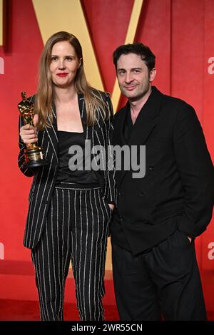 Justine Triet (left) and Arthur Harari attending the Vanity Fair Oscar Party held at the Wallis Annenberg Center for the Performing Arts in Beverly Hills, Los Angeles, California, USA. Picture date: Sunday March 10, 2024. Stock Photo