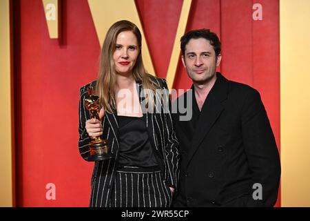 Justine Triet (left) and Arthur Harari attending the Vanity Fair Oscar Party held at the Wallis Annenberg Center for the Performing Arts in Beverly Hills, Los Angeles, California, USA. Picture date: Sunday March 10, 2024. Stock Photo