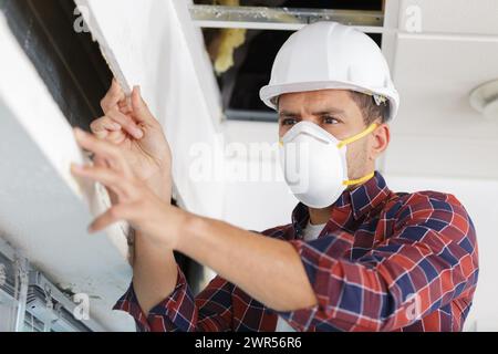 construction worker with protective mask Stock Photo