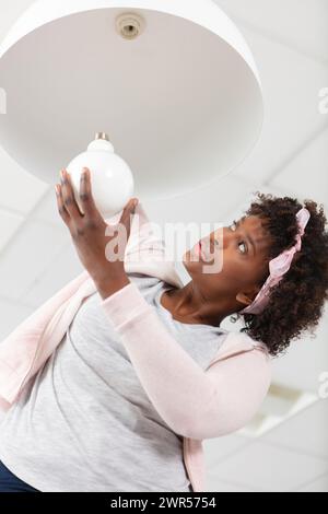 power save led lamp changing Stock Photo