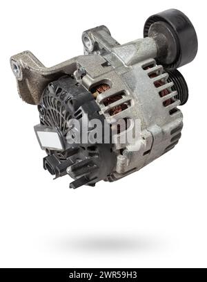 Car generator, car electrical network element on white background, generator details close-up. Spare auto parts for repair. Stock Photo