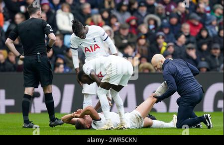 Birmingham, England, 10th March 2024.  Micky van de Ven of Tottenham is treated for injury during the Premier League match at Villa Park, Birmingham. Picture credit should read: Andrew Yates / Sportimage Stock Photo