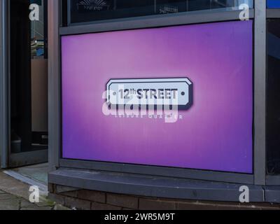 Sign for the 12th Street district of Central Milton Keynes, an area around the theatre housing many bars and restaurants. Stock Photo