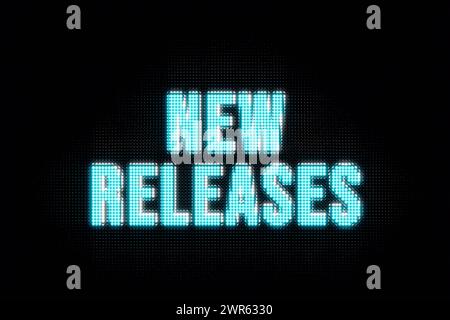 New releases. New releases. Banner in blue and white capital letters. The text, new releases, illuminated. Software update, shopping, retail, new, por Stock Photo