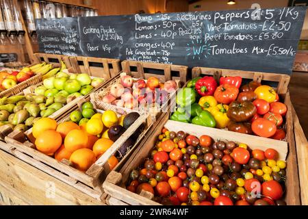 Fresh fruit and vegetables on display in a shop Stock Photo