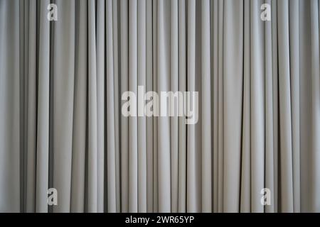 Wide grey velvet textile curtain background Stock Photo