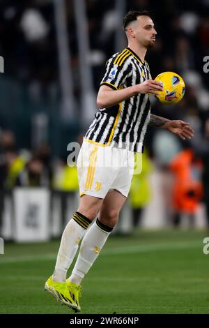 Turin, Italy. 10 March 2024. Federico Gatti of Juventus FC controls the ball during the Serie A football match between Juventus FC and Atalanta BC. Credit: Nicolò Campo/Alamy Live News Stock Photo