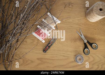 Top view of supplies for making DIY wicker wreath of birch branches Stock Photo