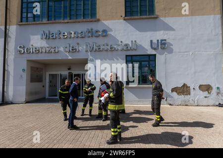 Intervento dei Vigili del Fuoco del Nucleo Nbcr presso la Facolt&#xe0; di Matematica e Scienza dei Materiali dell'Universit&#xe0; Bicocca in Via Francesco Cozzi 55, per lo scoppio di un'autoclave contenente acido cloridrico in un laboratorio - Cronaca - Milano, Italia - Luned&#xec;, 11 Marzo 2024 (foto Stefano Porta/LaPresse)&#xa0; Intervention by the Fire Brigade of the Nbcr Unit at the Faculty of Mathematics and Materials Science of the Bicocca University in Via Francesco Cozzi 55, due to the explosion of an autoclave containing hydrochloric acid in a laboratory - News - Mila Stock Photo