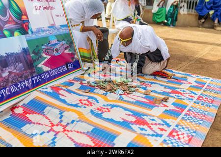 Bahir Dar, Ethiopia - April 21st, 2019: Community raising funds to fix the church during Easter holiday, reflecting the traditions and festive atmosph Stock Photo