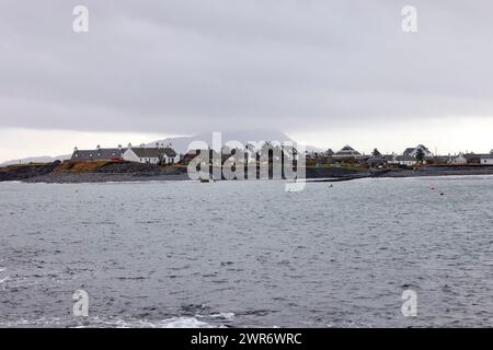 South west from Ellenabeich, and across Easdale Sound, an overcast February view of Easdale Stock Photo
