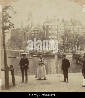 View of the Blaak in Rotterdam with the Lutheran church in the background, seen from the Schiedamsedijk, Holland. Rotterdam. Across the Canal (title on object), anonymous, publisher: William Herman Rau, Rotterdam, publisher: Philadelphia, 1896 - 1910, cardboard, albumen print, height 89 mm × width 177 mm, stereograph Stock Photo